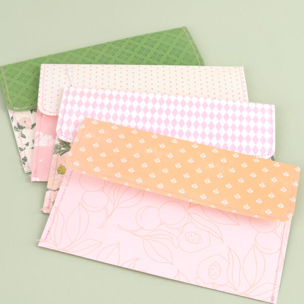 hand-made paper-craft envelopes by Alice Wilks using Primavera by Rosie's Studio. Showcasing machine stitching and 12 x 12 papers